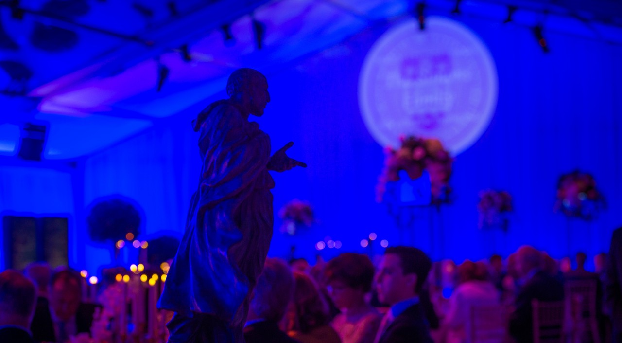 A statue of Society of Jesus founder St. Ignatius Loyola overlooked the gala venue.