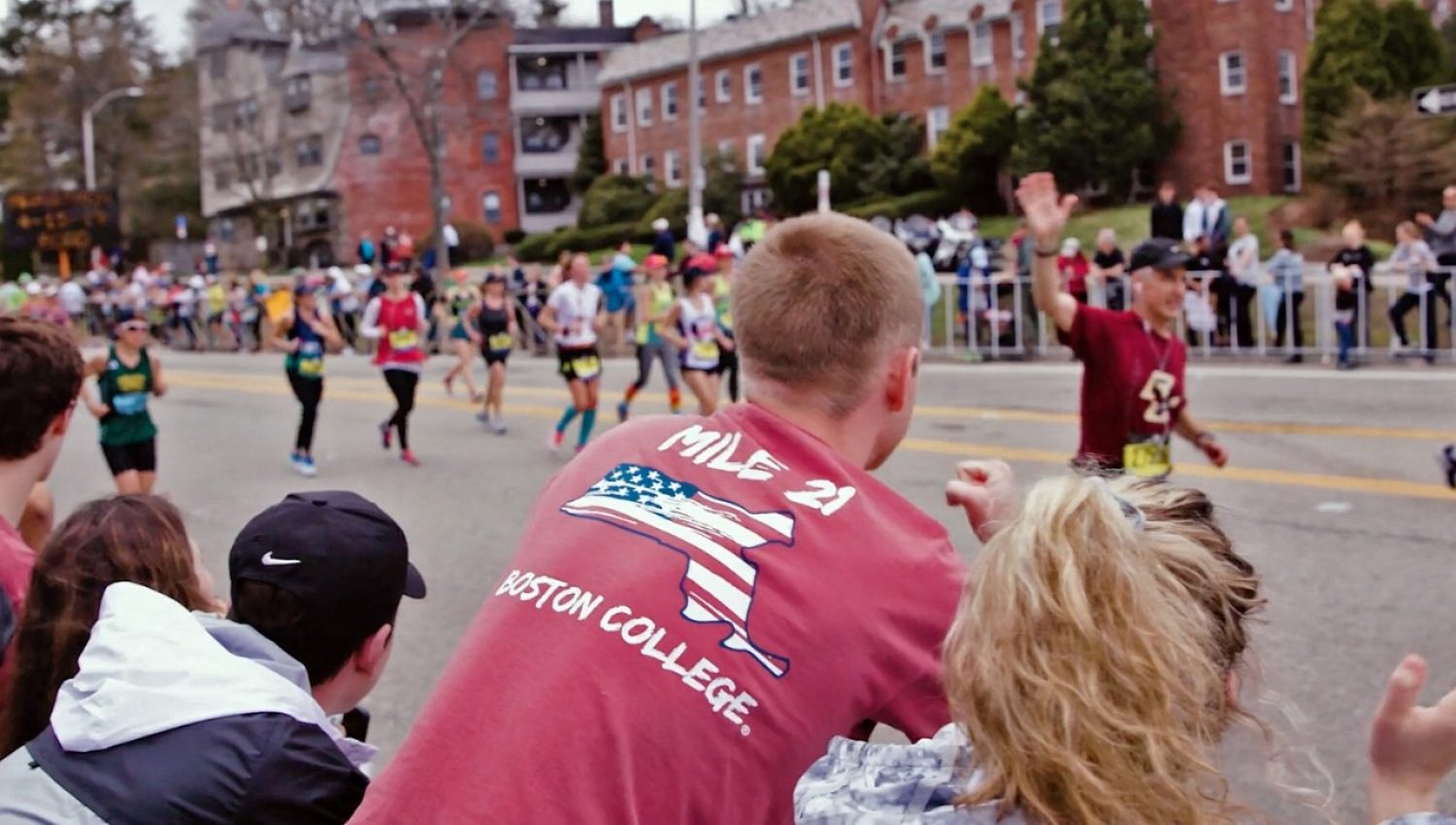 Spectators cheering at the Boston Marathon