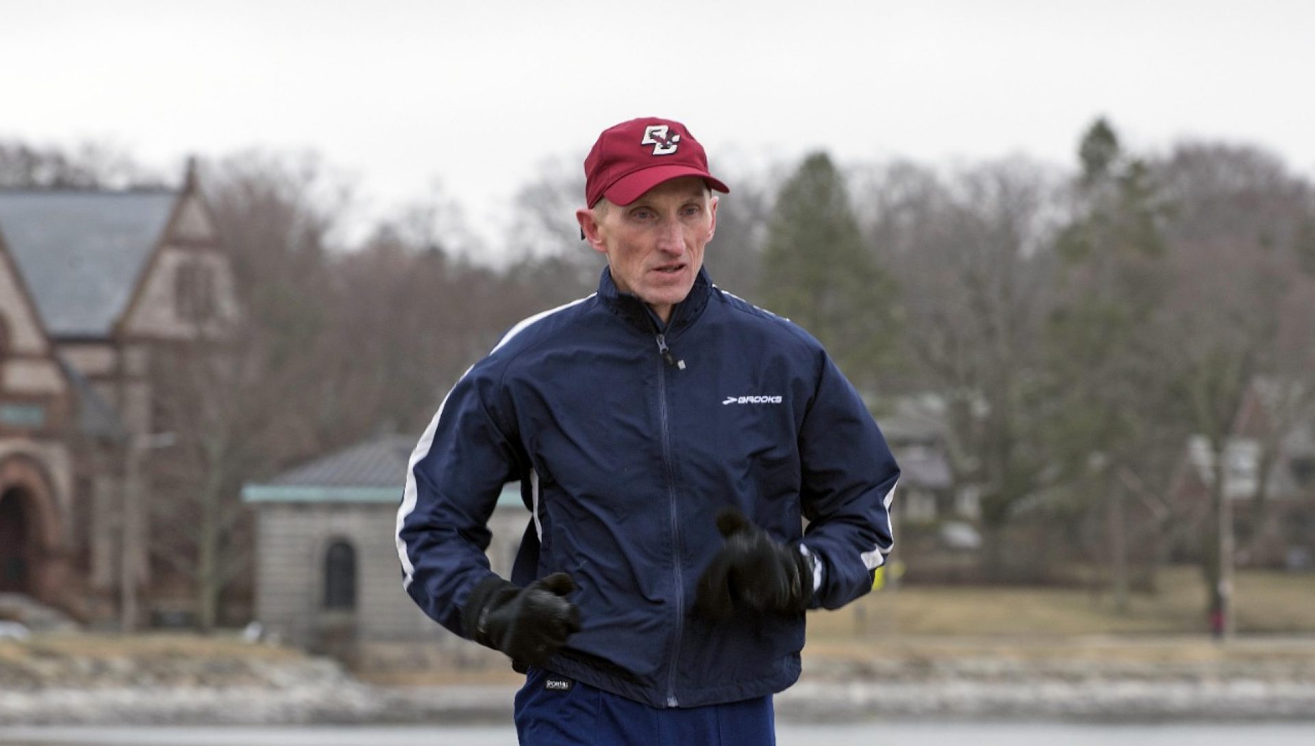 William Evans running along the reservoir