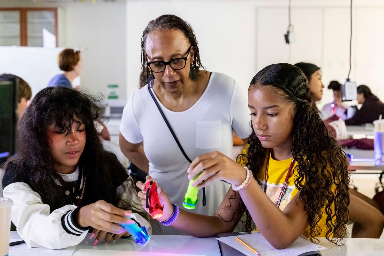 Joy Moore with students in a class session