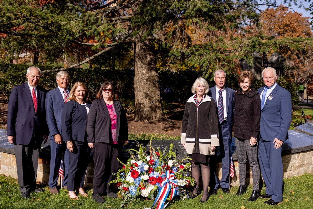 Redgate family members as they are presented the inscription of Lt. Thomas Redgate
