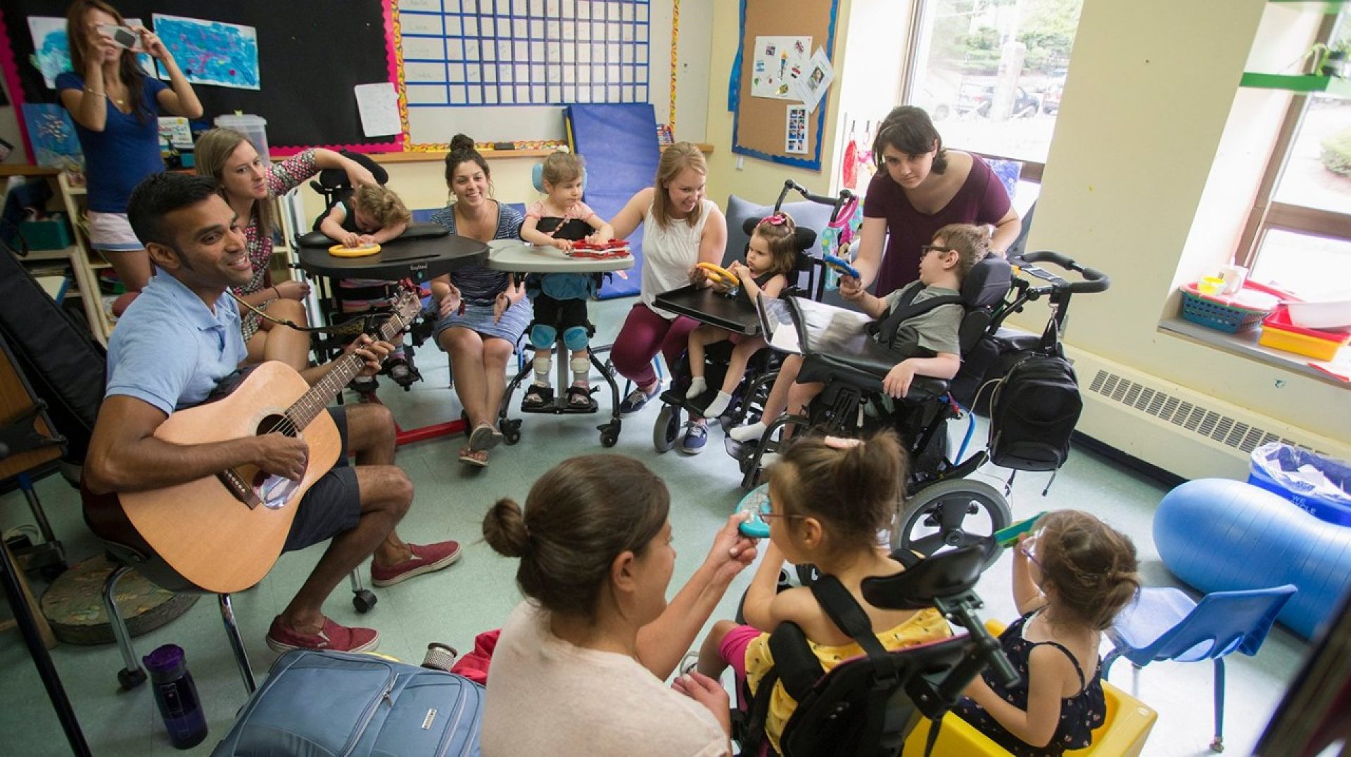 A group of students and teachers in a Campus School classroom