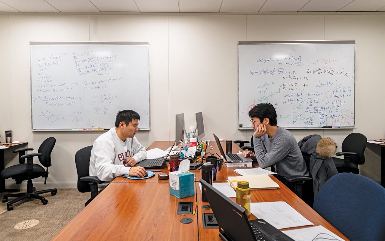 Fuxin Zhai and Yoshibumi Makabe in economics classroom