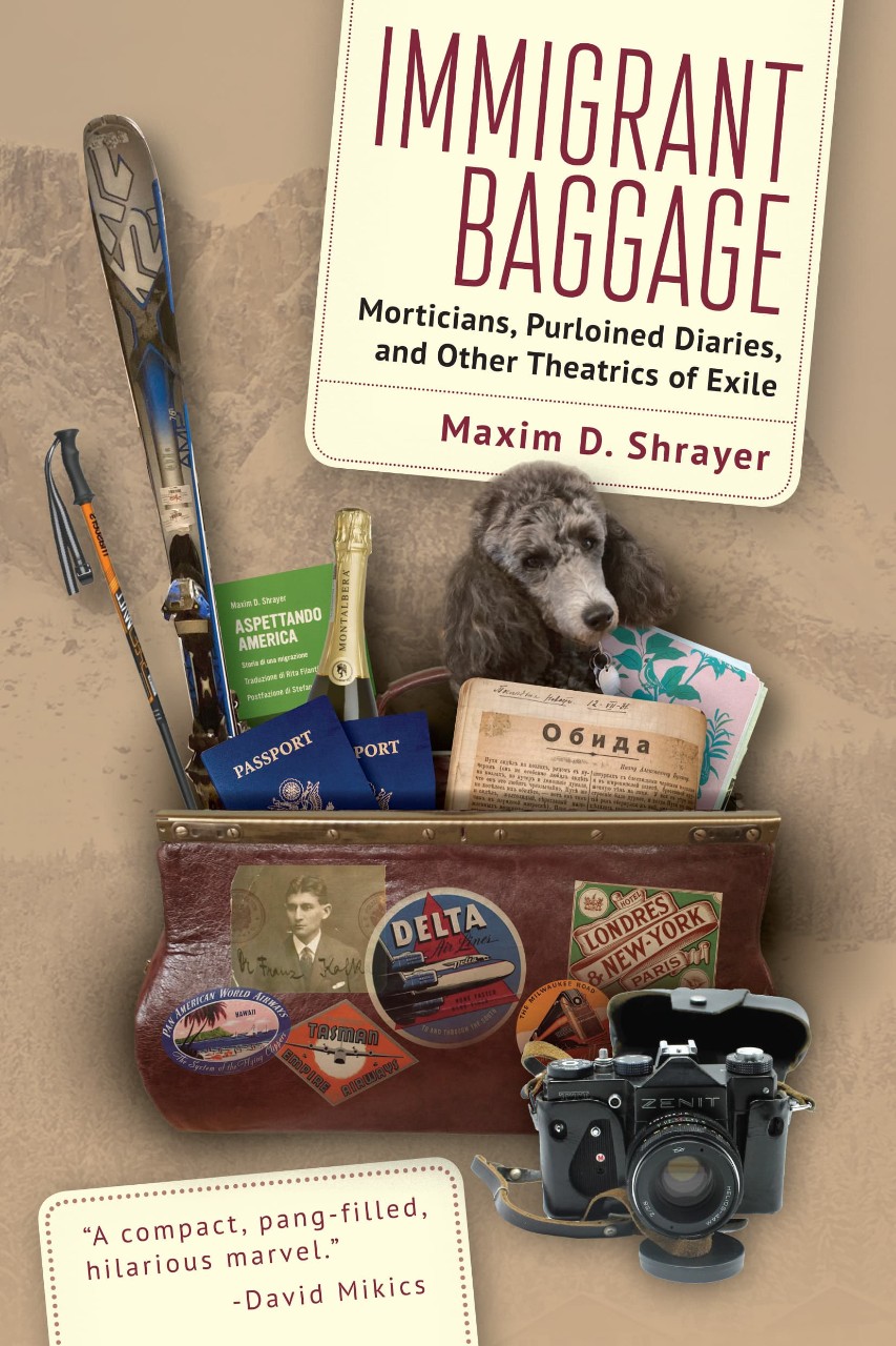 cover of the book "Immigrant Baggage" - dog, camera, and other items in a travel bag