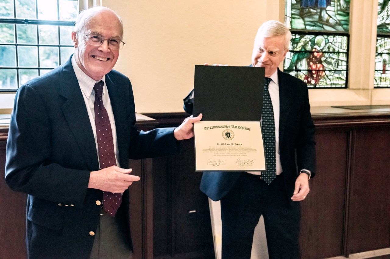 Richard Tresch holding his citation