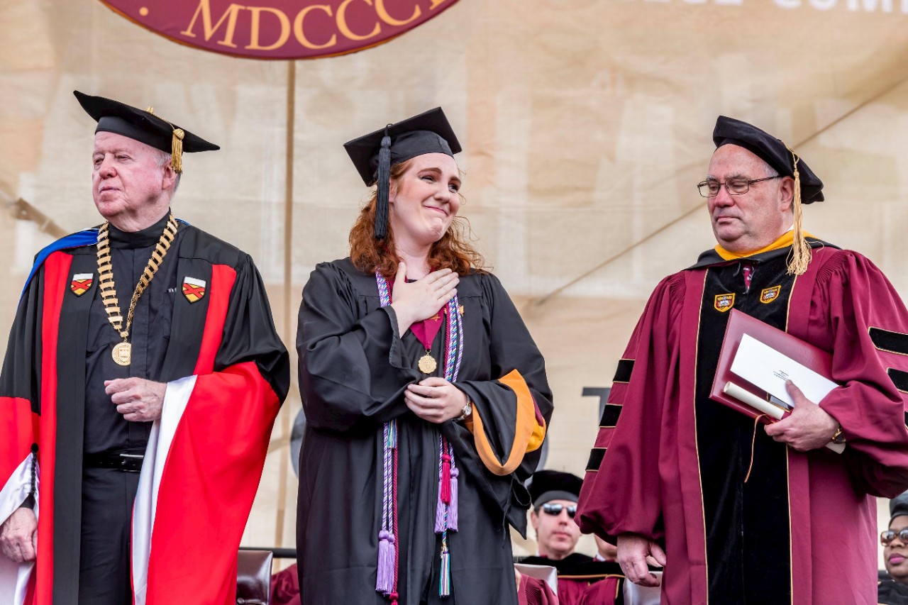 Fr. Leahy, Finnegan Award winner Maria Meyer, Peter Markell