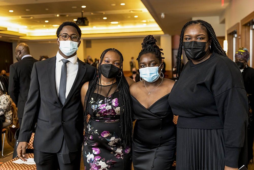 Four of the MLK Scholarship finalists standing together