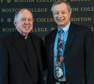 University President William P. Leahy, S.J., with Associate Professor of Sociology Michael Malec, at the presentation of BC's 2016 Community Service Award. (Photo by Lee Pellegrini)