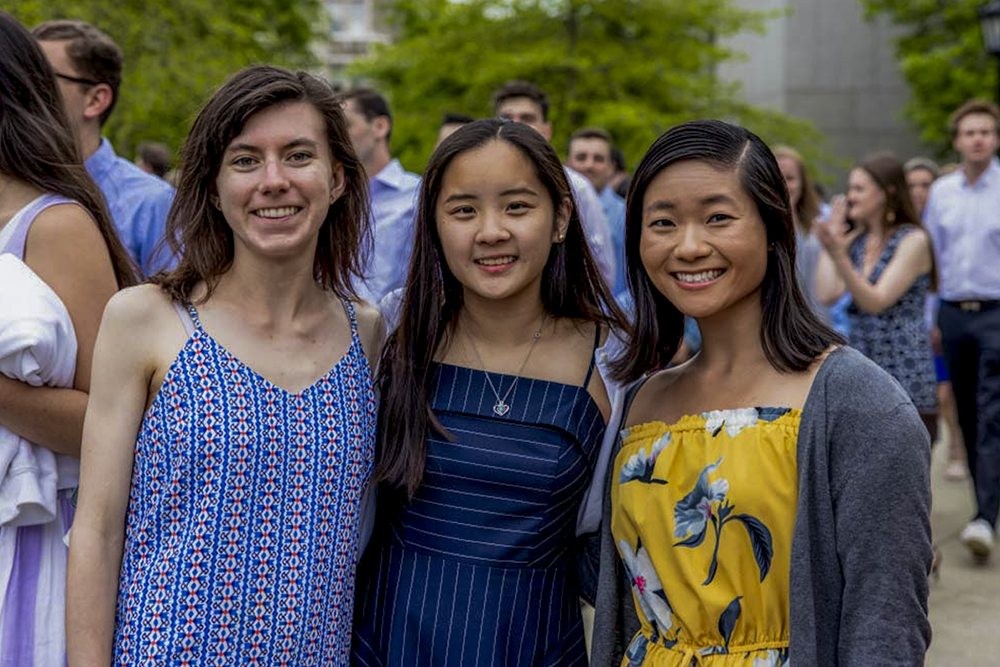 Three students posing together for a photo