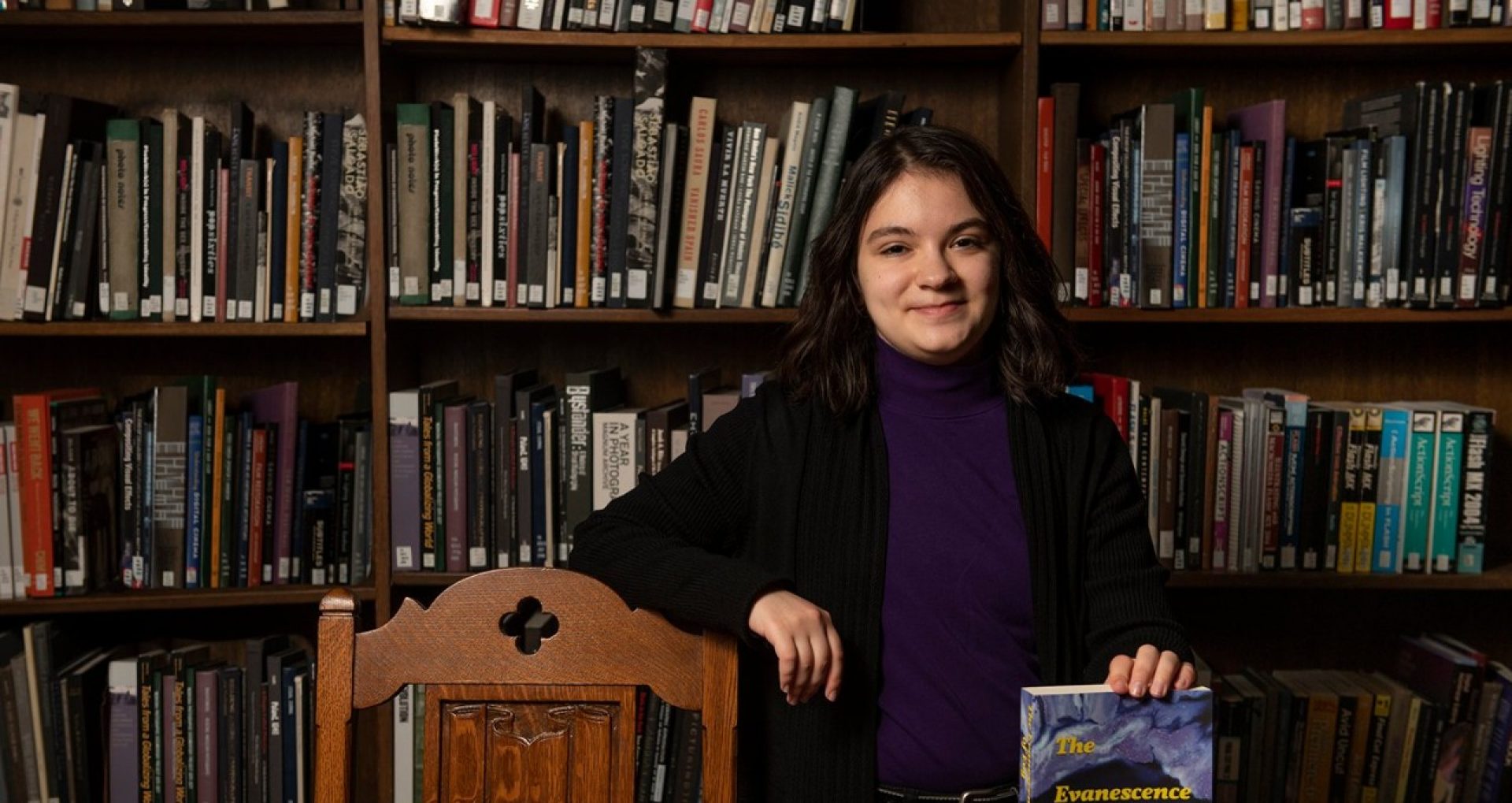 Louise Faitar with her book