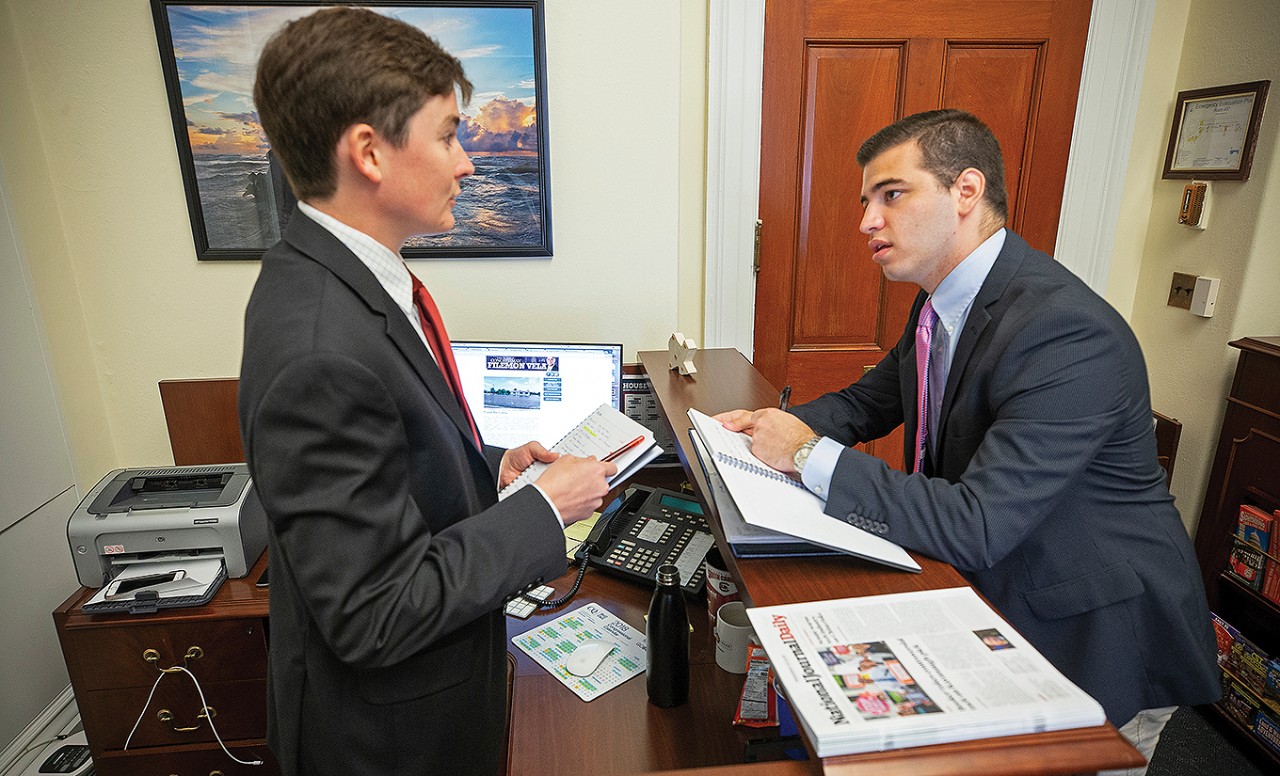 Jaime Martinez with press aide Benjamin Cole