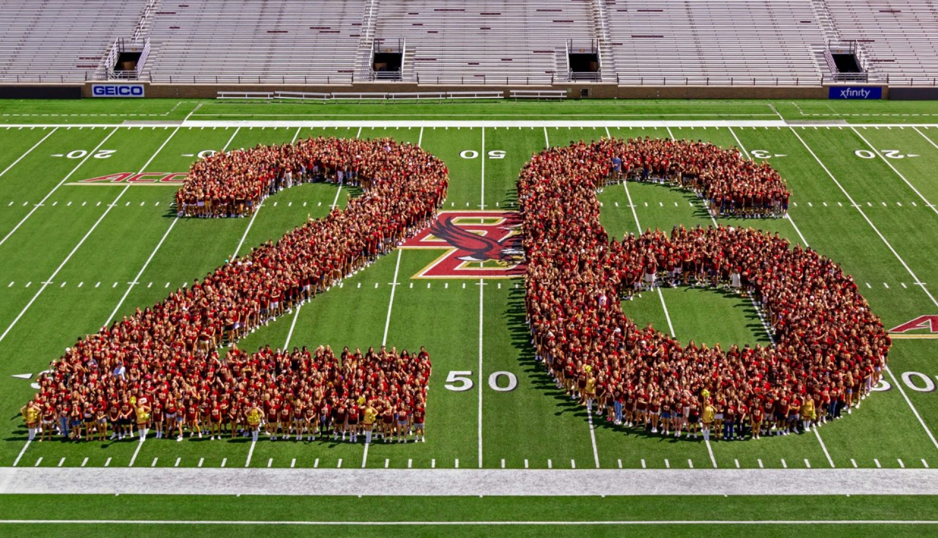 students form '26' in Alumni Stadium