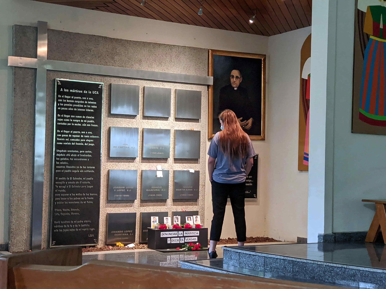 Victoria Newell '22 in front of the Jesuit Martyrs grave at the University of Central America.