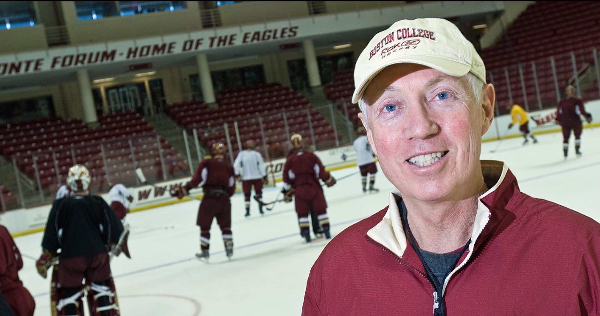 BC Hockey Head Coach Jerry York with students