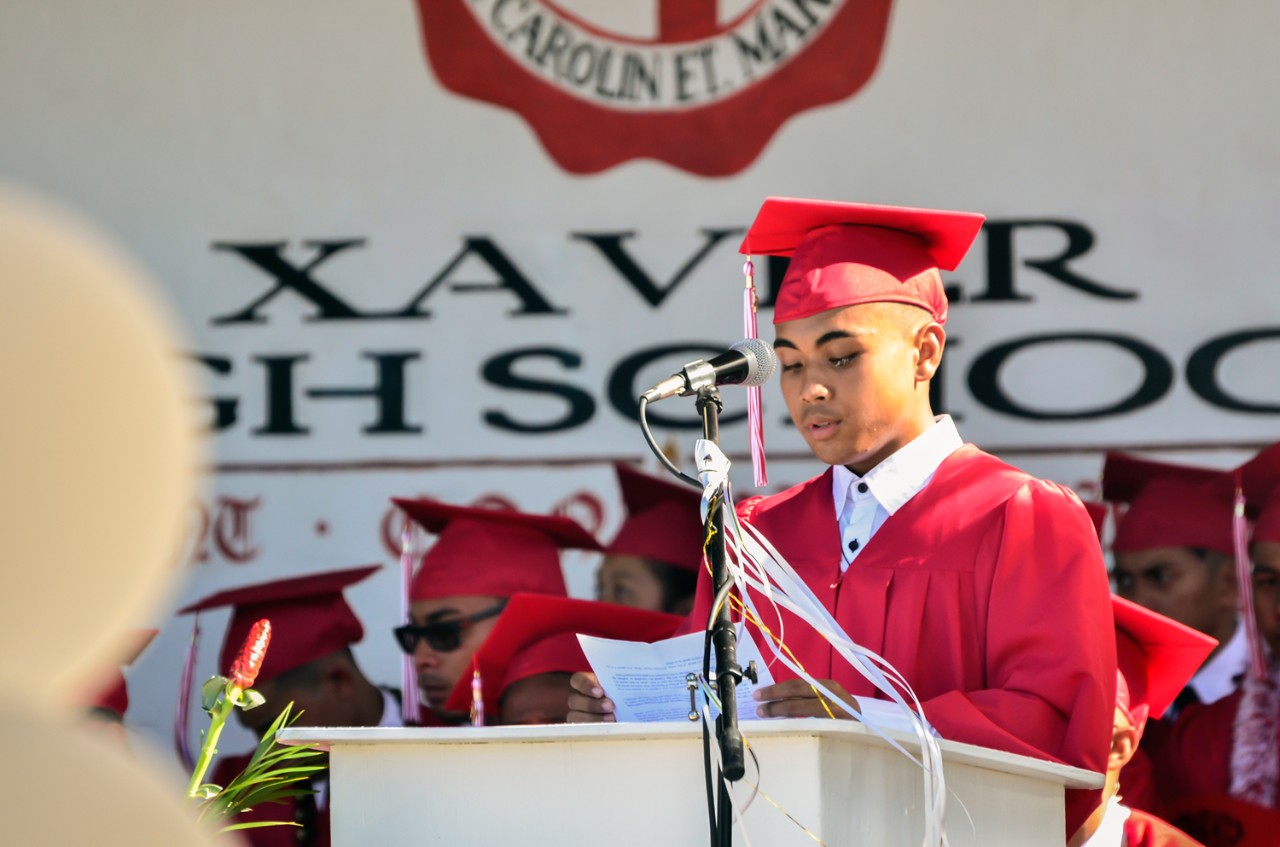 A graduating student at Micronesia's Xavier High School.