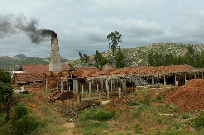 A brick kiln with a smokestack