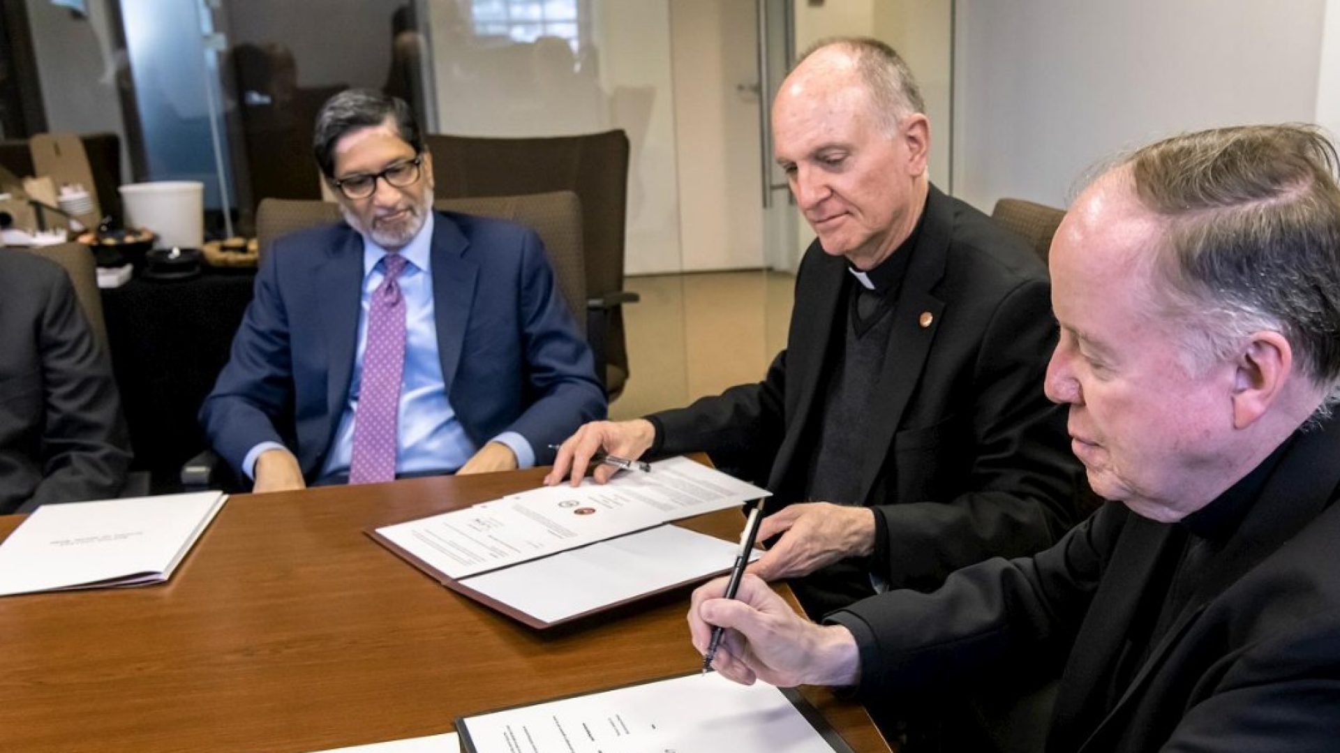 BC President William P. Leahy, SJ, and JRS International Director Thomas Smolich, SJ