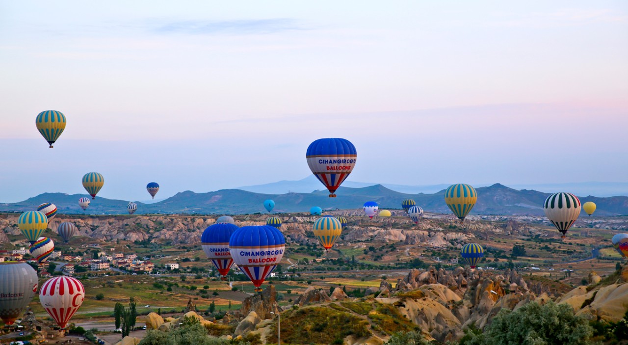 Hot air balloons Hot air balloons take flight at dawn above Cappadocia, in central Turkey