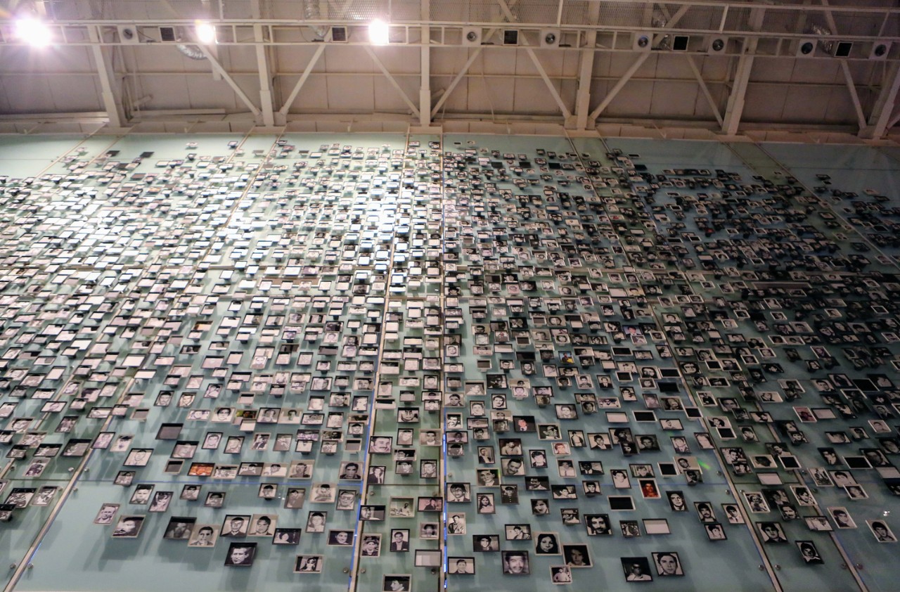 A wall bearing the photographs of some of the thousands of people murdered or "disappeared" by the Pinochet dictatorship. Museum of Memory and Human Rights, Santiago, Chile A wall bearing the photographs of some of the thousands of people murdered or "disappeared" by the Pinochet dictatorship. Museum of Memory and Human Rights, Santiago, Chile