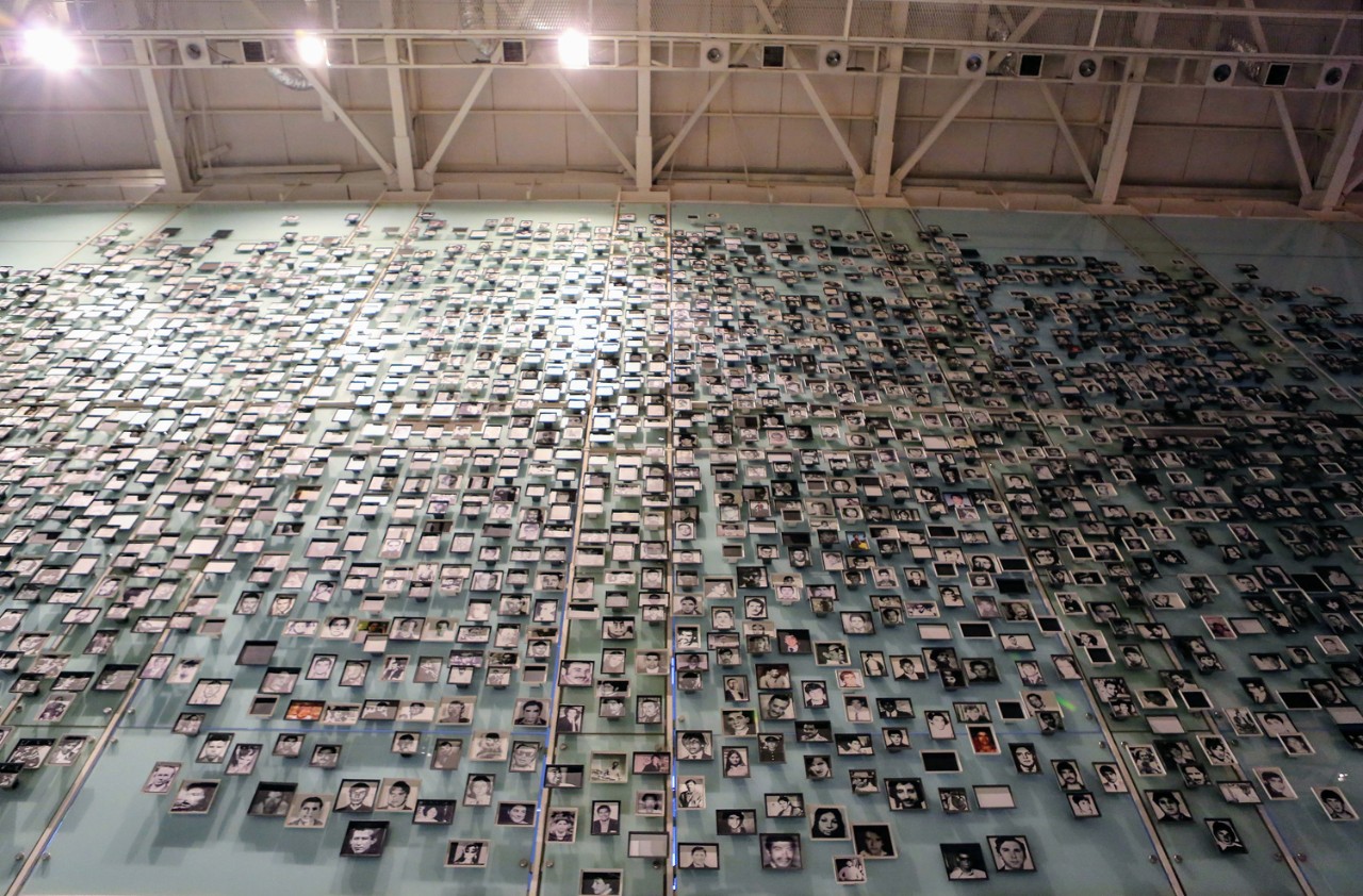 A wall bearing the photographs of some of the thousands of people murdered or "disappeared" by the Pinochet dictatorship. Museum of Memory and Human Rights, Santiago, Chile