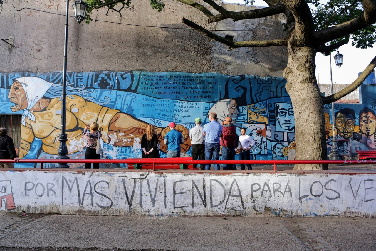 In Buenos Aires, Boston College faculty examined a mural commemorating the struggle for human rights in Argentina In Buenos Aires, Boston College faculty examined a mural commemorating the struggle for human rights in Argentina