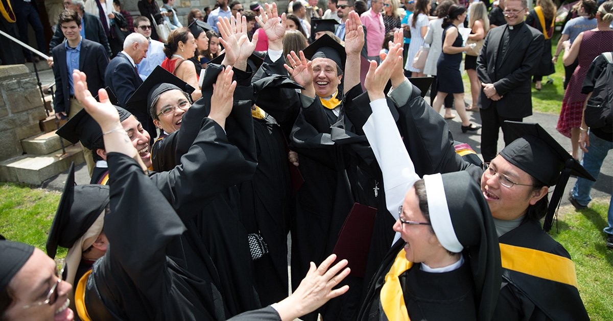 Women religious in cap and gown