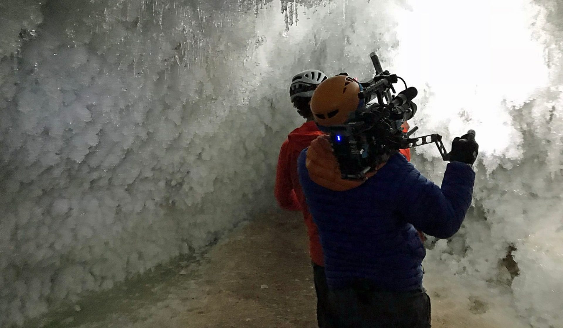 scientists in cave