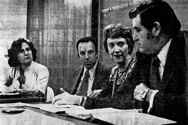 Burgess on panel in the 1970s