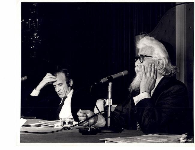 headshots of Heschel and Wiesel