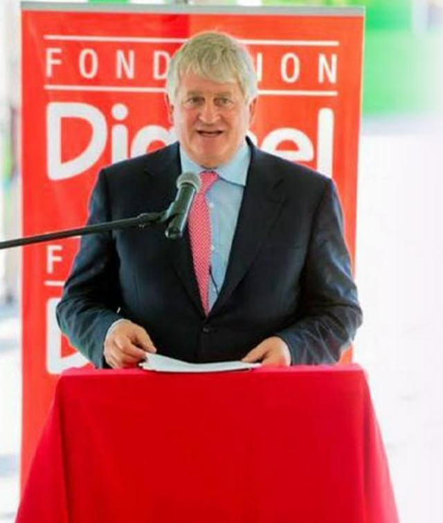 Denis O'Brien MBA ’82 speaking at a Digicel Foundation event