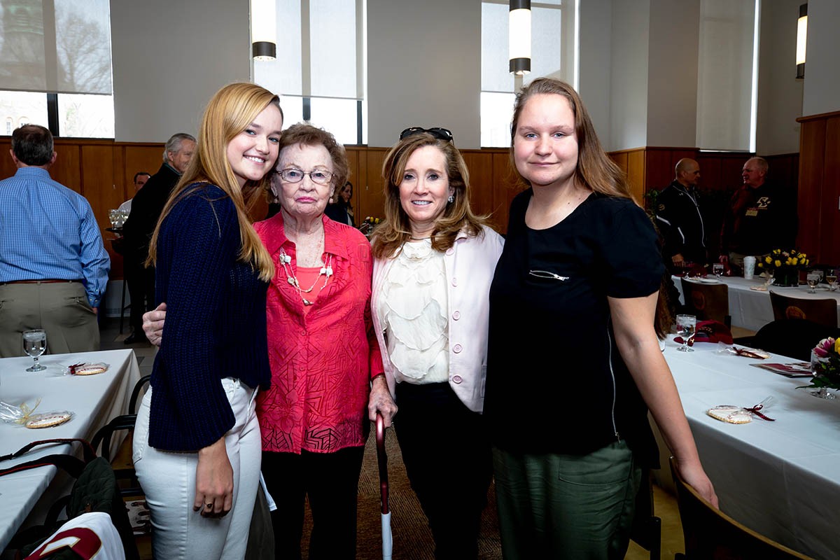 Attendees pose at the Harrington Athletics Village Dedication
