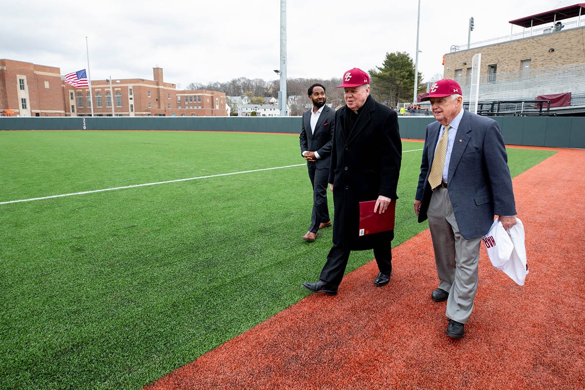John Harrington walks with others.