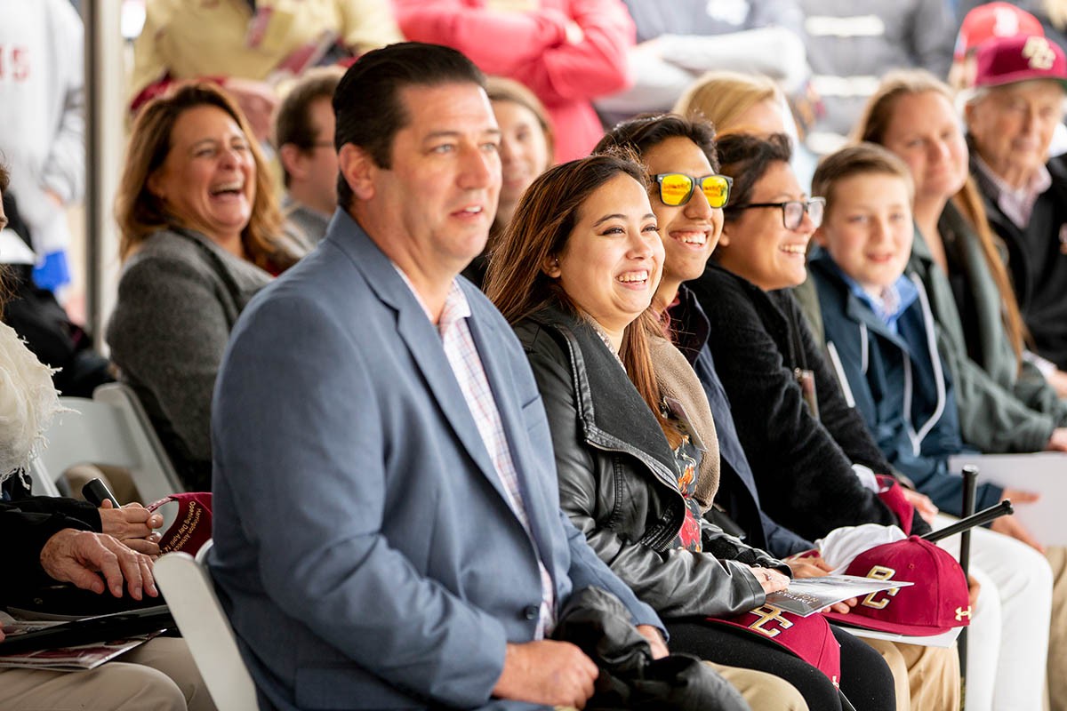 crowd reacts positively to something said during a speech
