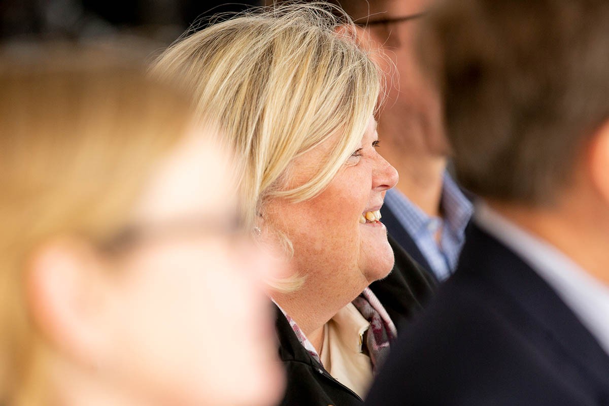 crowd reacts positively to something said during a speech.