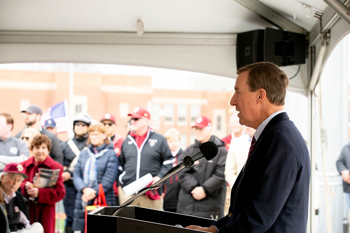 a speaker speaks to a crowd