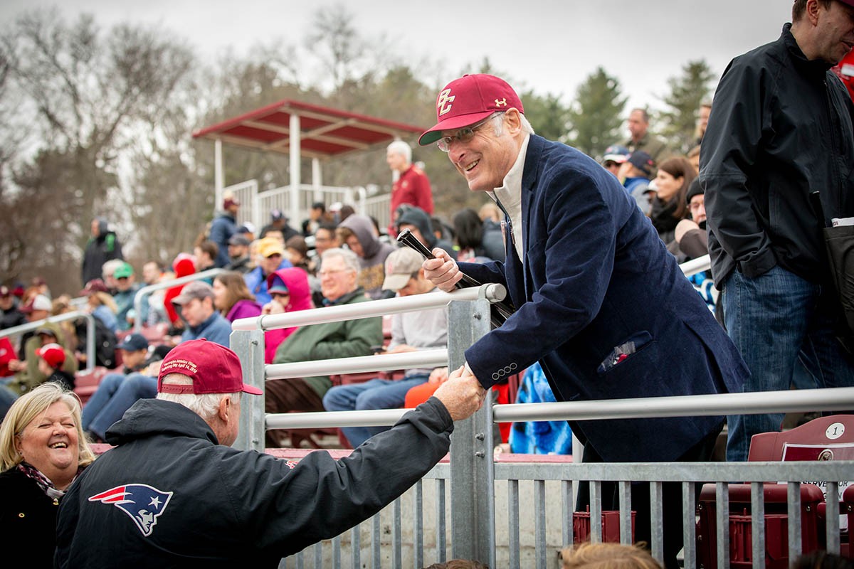 John Harrington shaking the hand of an attendee