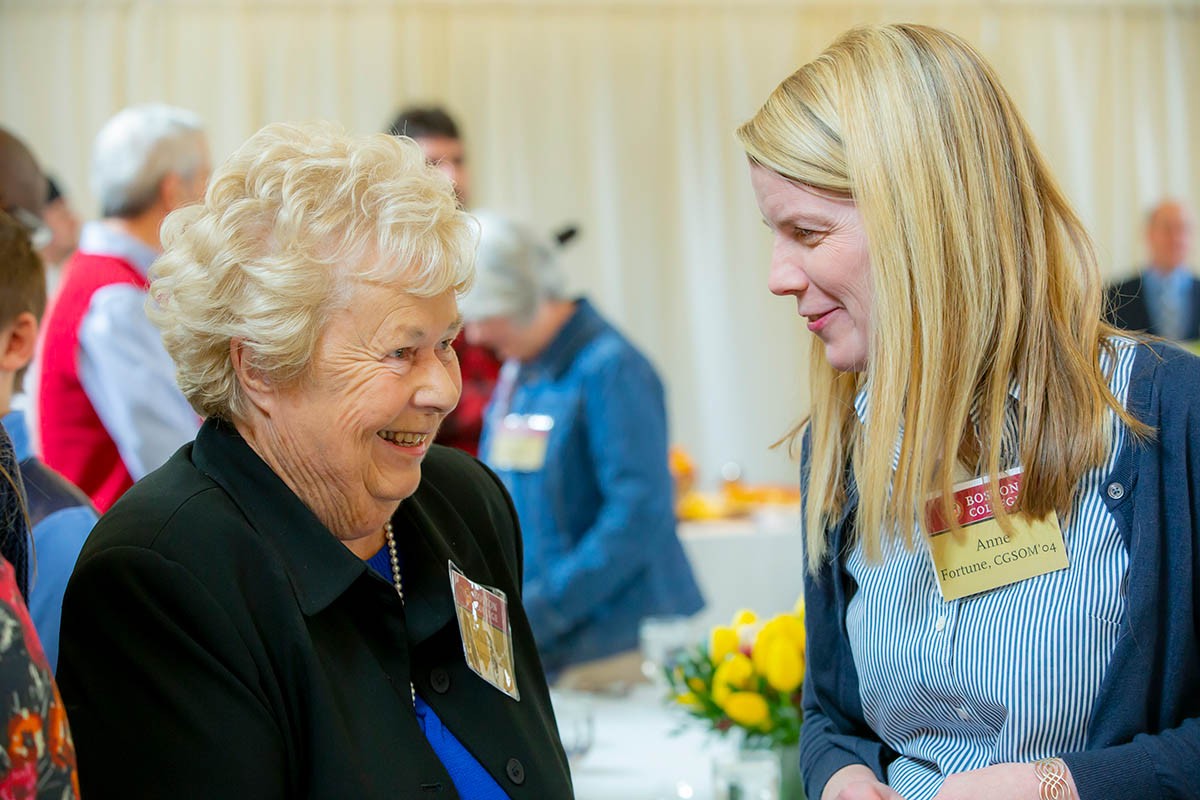 two women speaking to each other