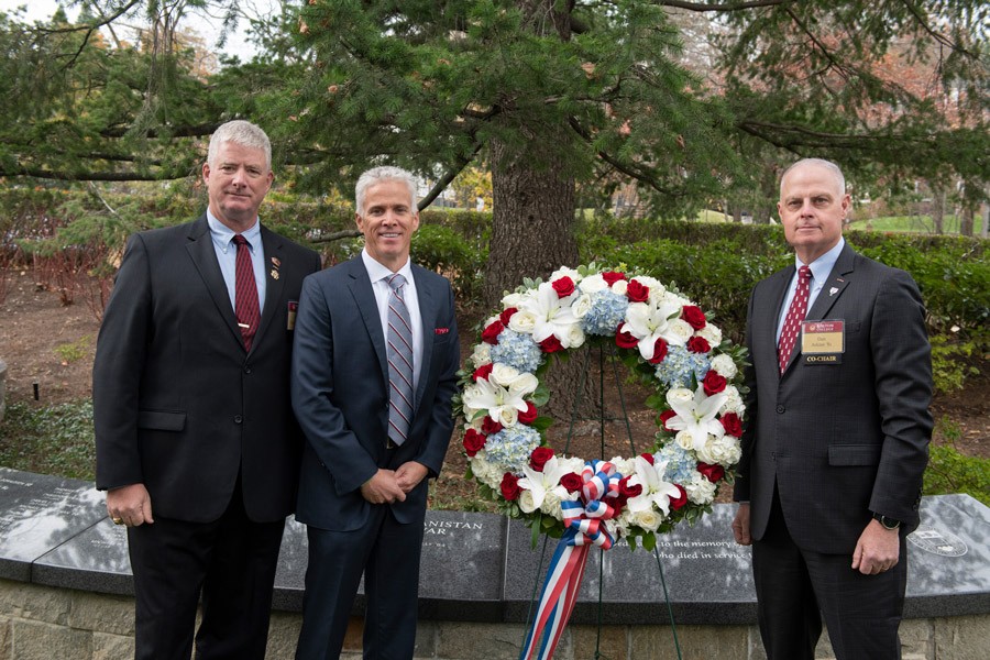 Col. (ret.) George J. Harrington ’80 and Col. (ret.) Daniel M. Arkins ‘81 flank Joseph P. Connolly ’85