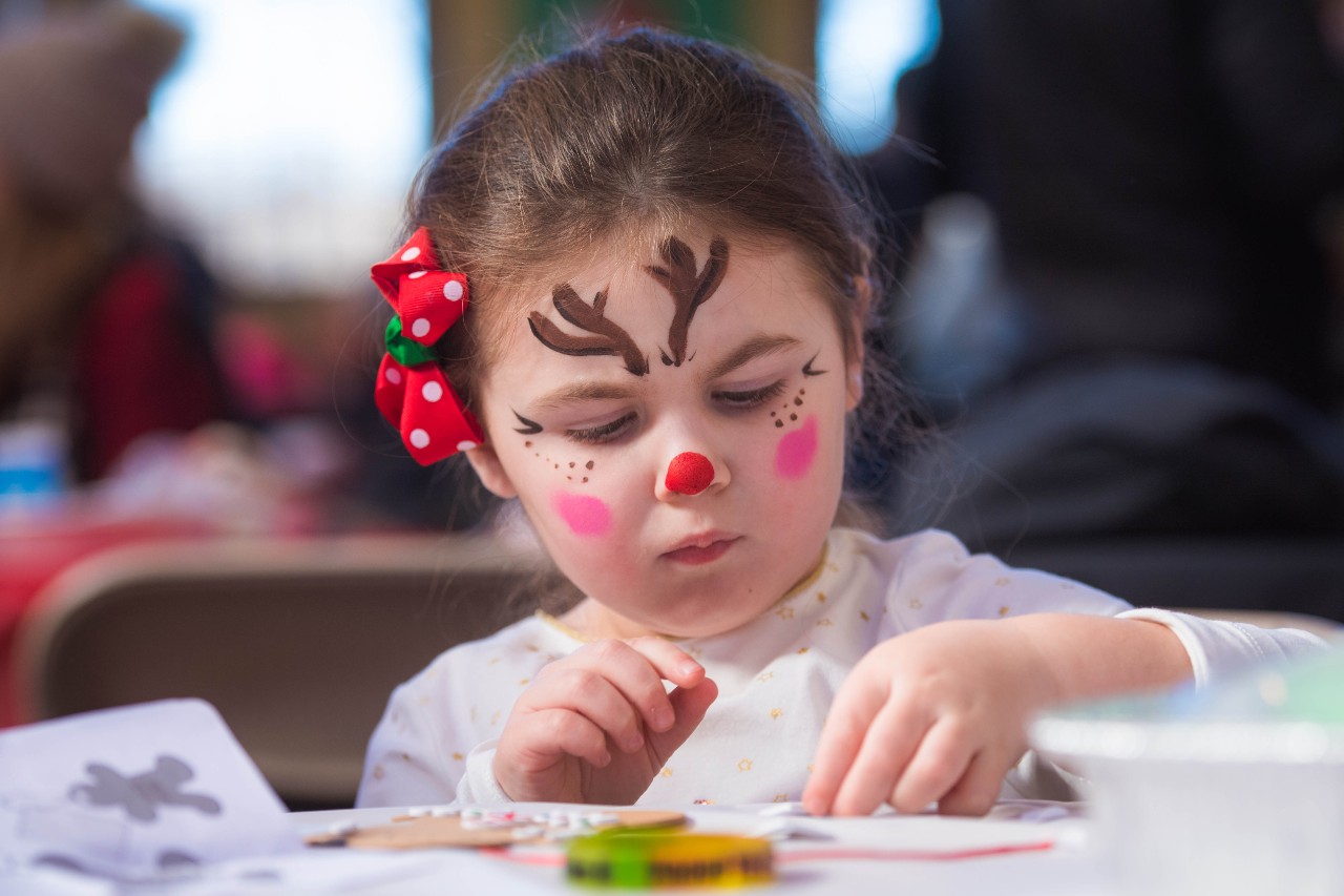 Child with face painted