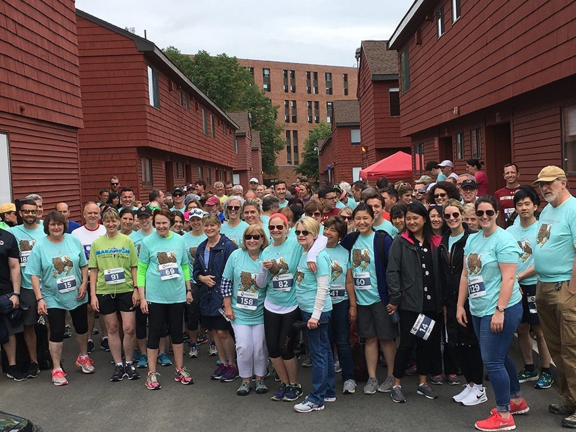 A group of people participating in a road race