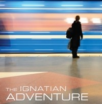 Image of person standing with lights in motion behind them. Text reads The Ignatian Adventure