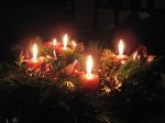 Advent wreath with 4 red lit candles