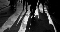 Black and white images of people walking