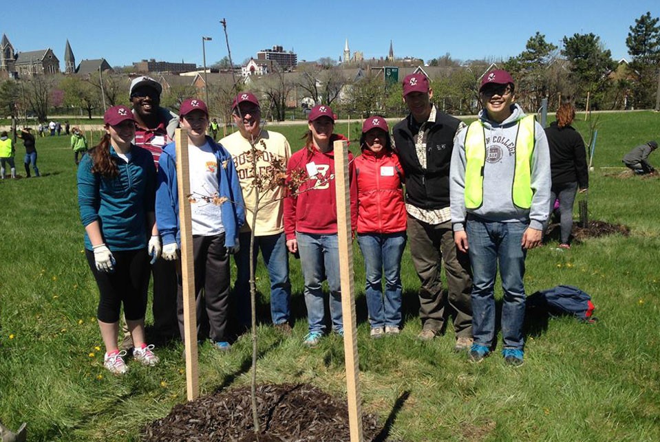 A group of volunteers standing in a field