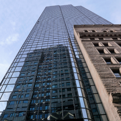 Photo looking up at Boston skyscraper building