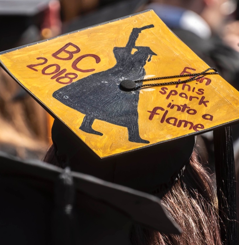 Group of graduates gathered on campus