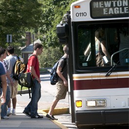 Student boarding the BC Shuttle bus
