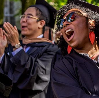 Students cheering at graduation