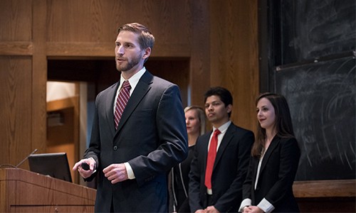 Students presenting in Fulton Hall