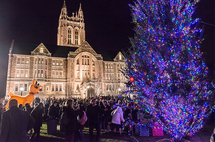 Christmas tree lighting ceremony in front of Gasson Hall